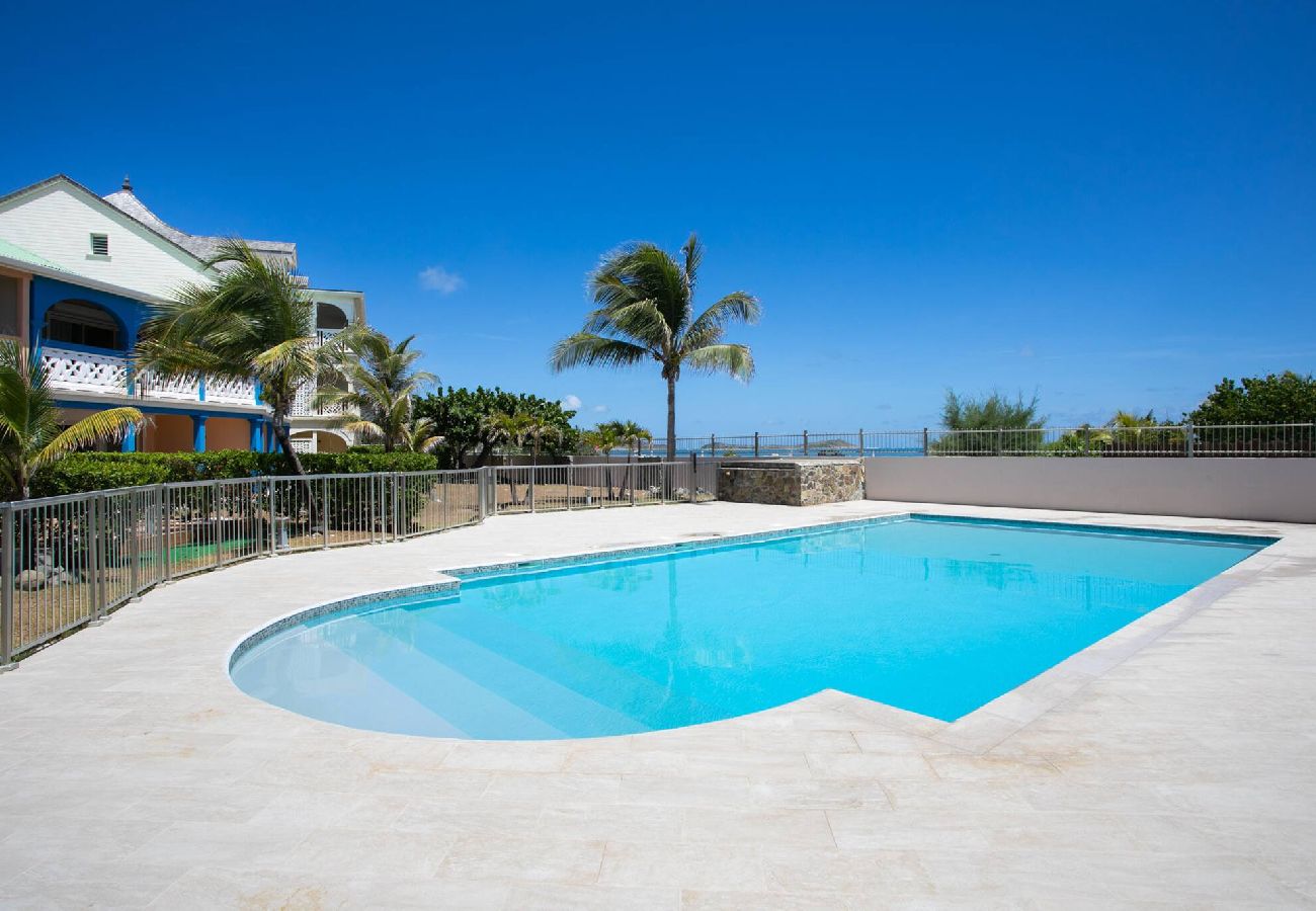 Appartement à Baie orientale - Caribbean Riviera 4 : confort les pieds dans l´eau