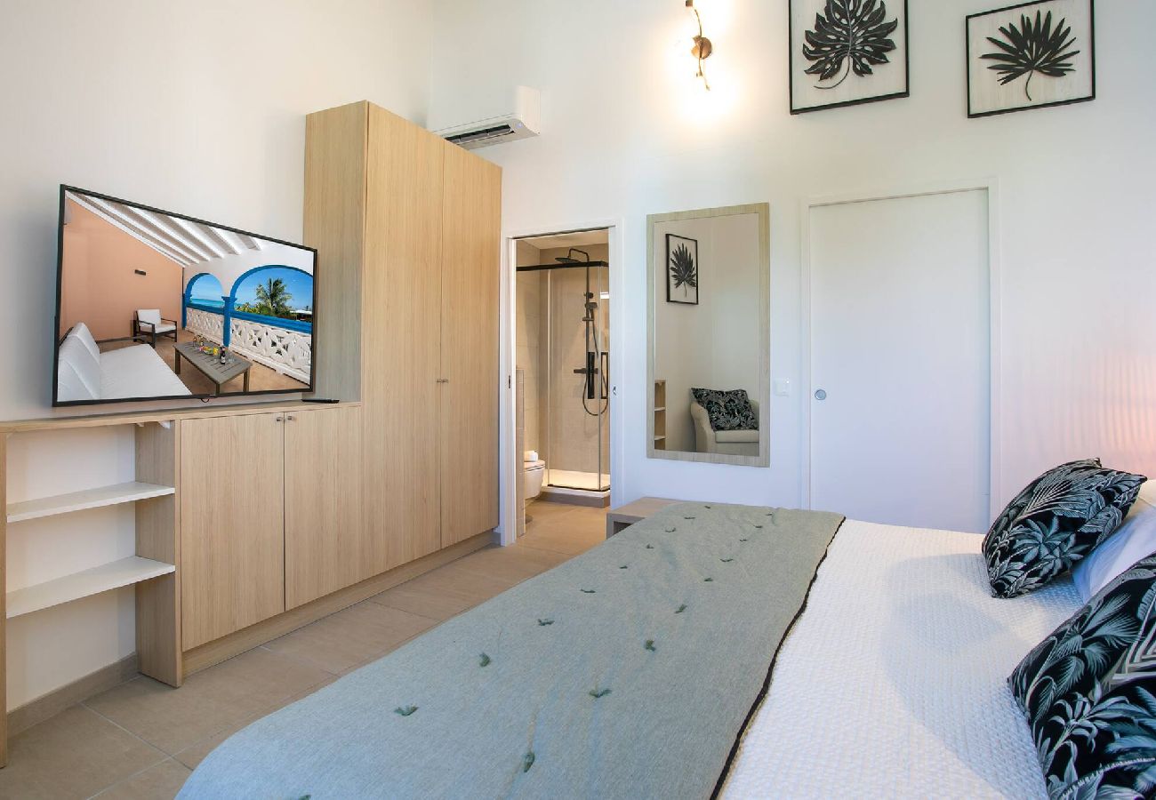 Appartement à Baie orientale - Caribbean Riviera 4 : confort les pieds dans l´eau