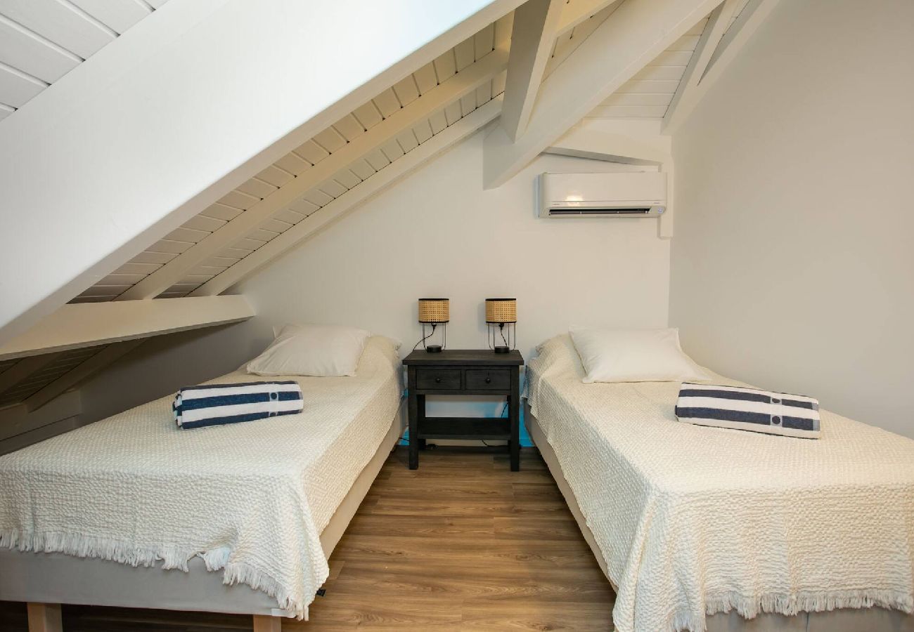 Appartement à Baie orientale - Caribbean Riviera 4 : confort les pieds dans l´eau