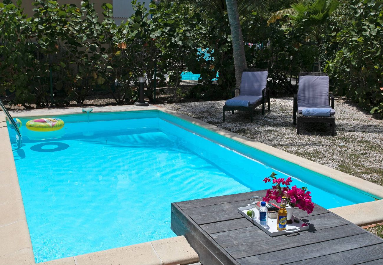 Villa à Baie orientale - Macassi 4, maison avec piscine a 2 pas de la plage