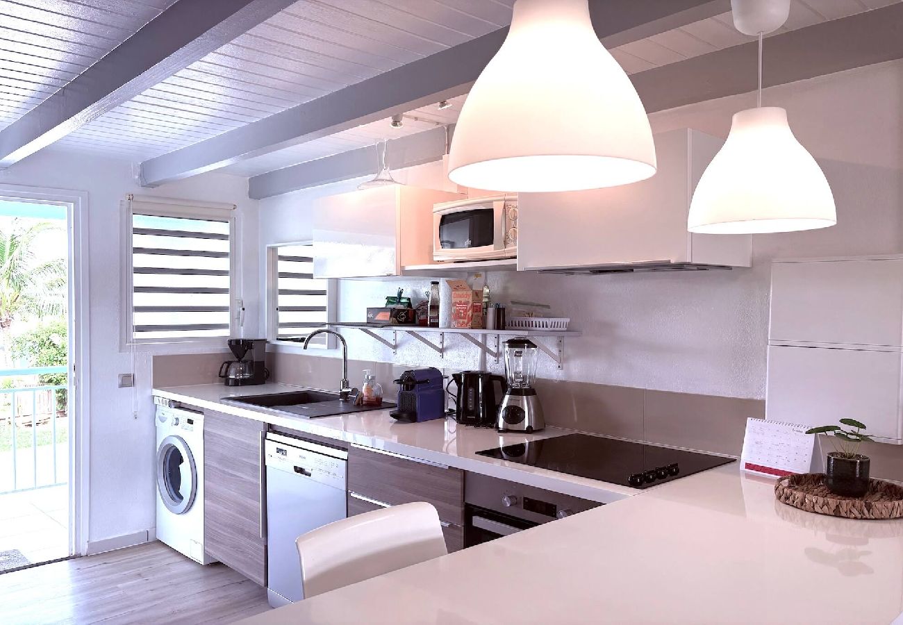 Appartement à Baie orientale - Beach loft, vue mer plage Baie Orientale